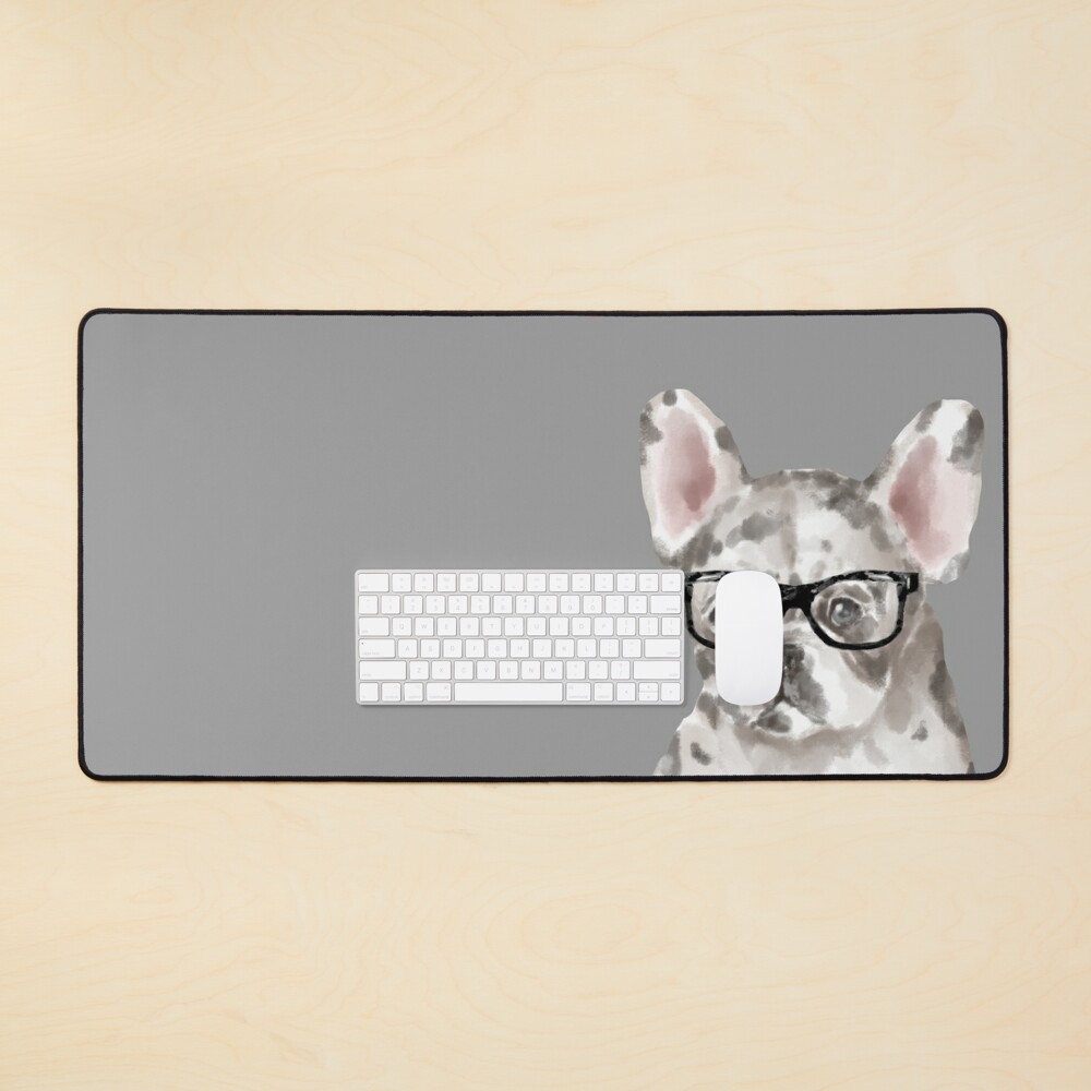 Merle French Bulldog on desk-mat with glasses